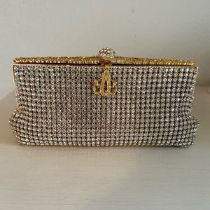 Silver, beaded clutch with gold accents.